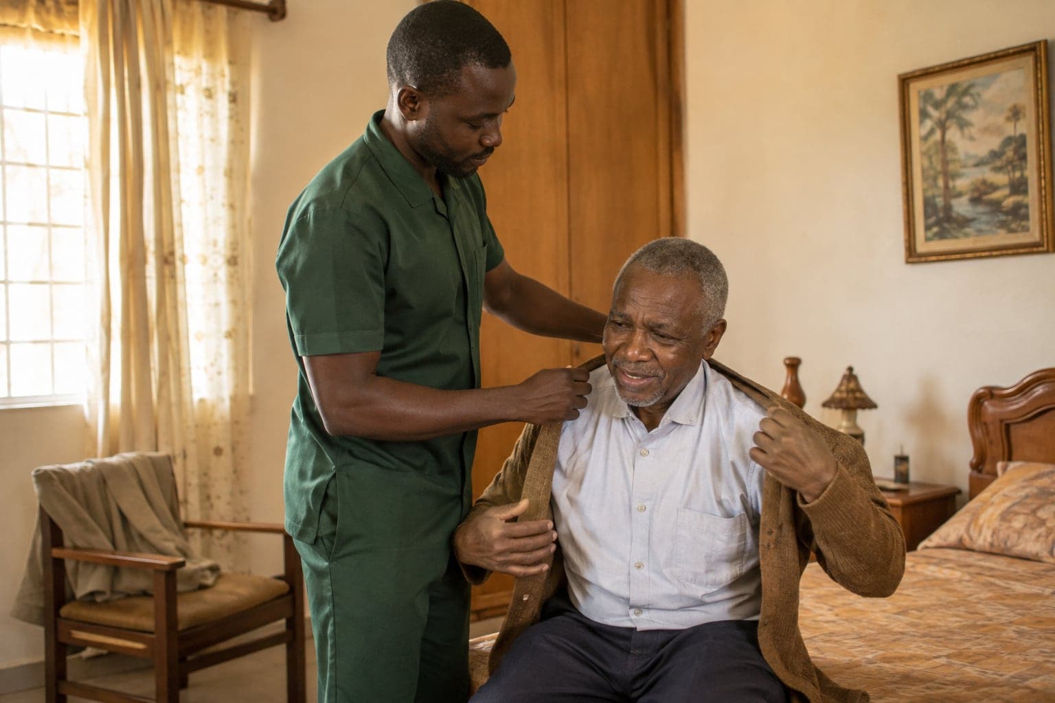 A Kenyan live-in caregiver helping an older man put on a cardigan during his morning routine